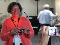 Laverne (Brandon) Page prepares to photo the photo taker.